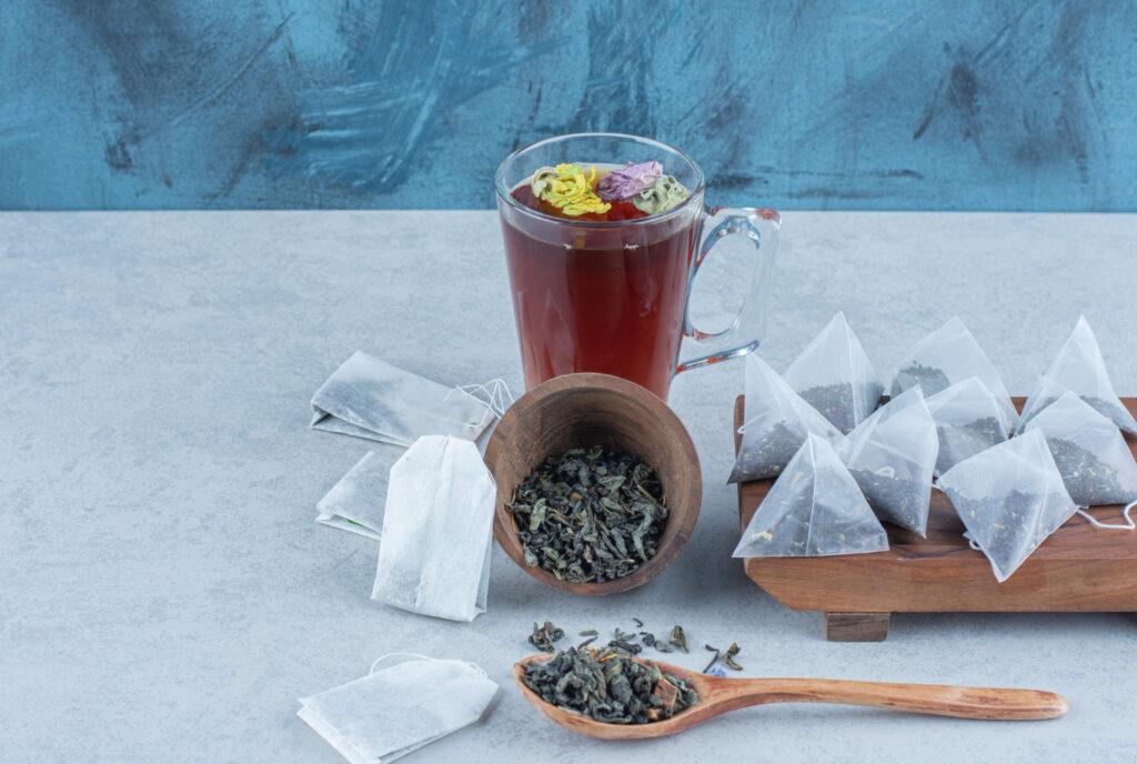 overturned-bowl-full-tea-leaves-spoon-cup-tea-tea-bags-board-marble-1024x688 Unveiling the Art of Tea Bag Compresses