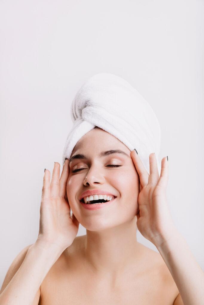 positive-lady-enjoys-morning-spa-treatment-girl-after-shower-posing-isolated-wall-683x1024 The Remarkable White Tea Skin Benefits You Need to Know About