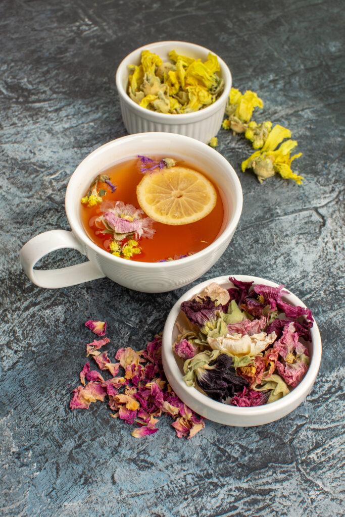 herbal-tea-with-dry-flowers-plate-grey-ground-683x1024 Balancing Act: The Truth About Acidity in Herbal Teas